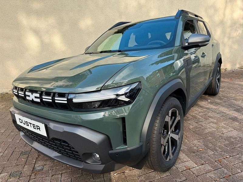 Grau Neu 2025 Dacia Duster Journey SUV | 30.425 € (Fairer Preis) - Bild 1/4