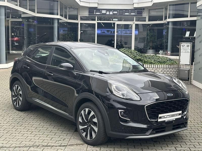Obsidianschwarz Gebraucht 2023 Ford Puma Gen-E Ambiente SUV | 17.444 € (Superpreis) - Bild 1/2
