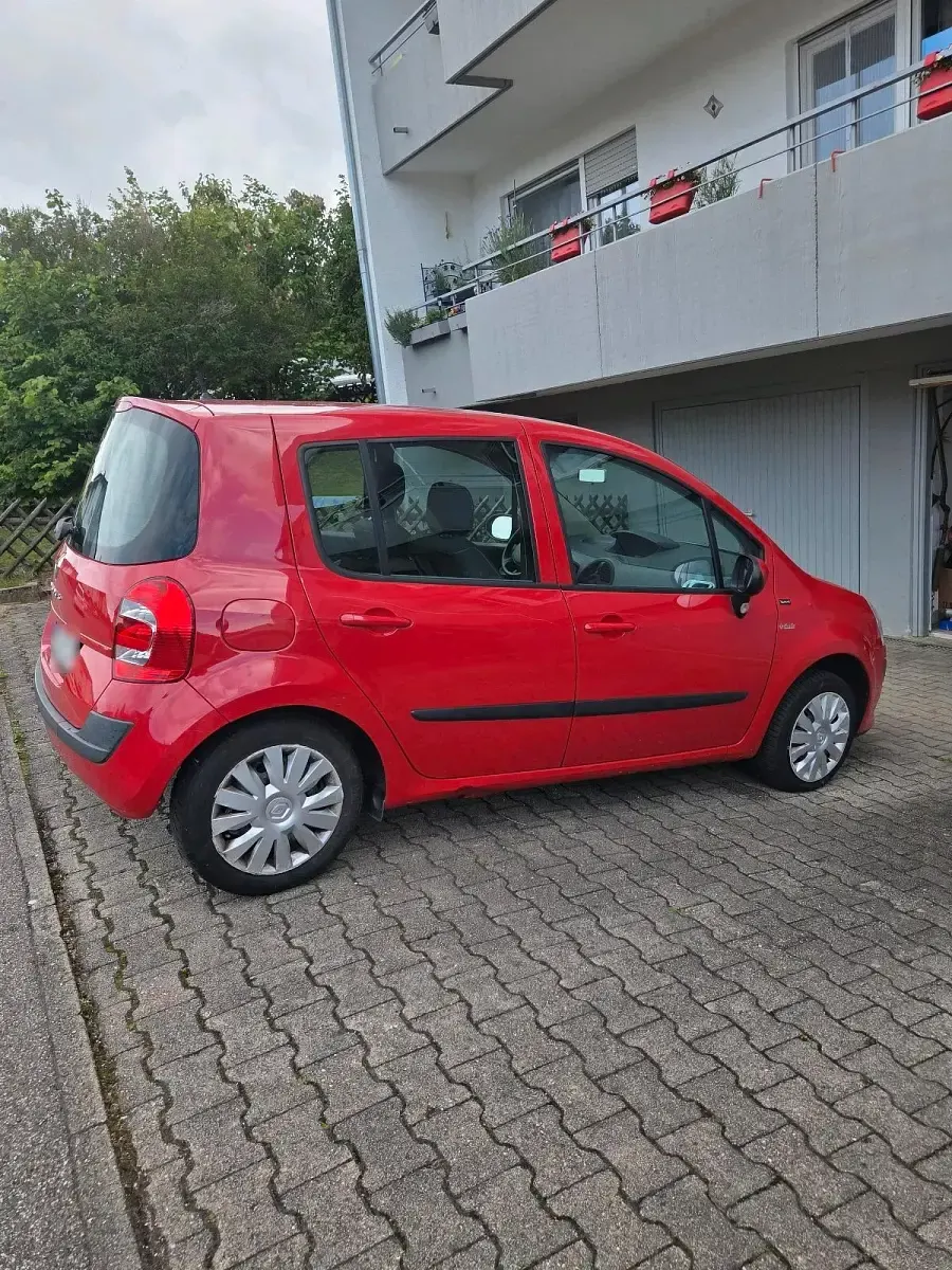 Używany Renault Modus 75 KM (55 kW) 2012 Czerwony Minivan
