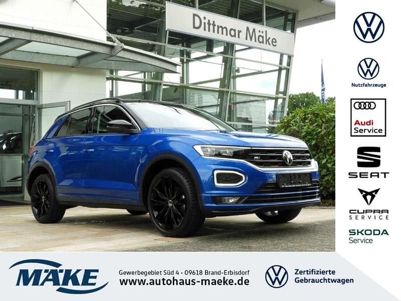 Ravennablau metallic (metallic) Gebraucht 2021 VW T-Roc R-line SUV | 28.890 € (Fairer Preis) - Bild 1/4