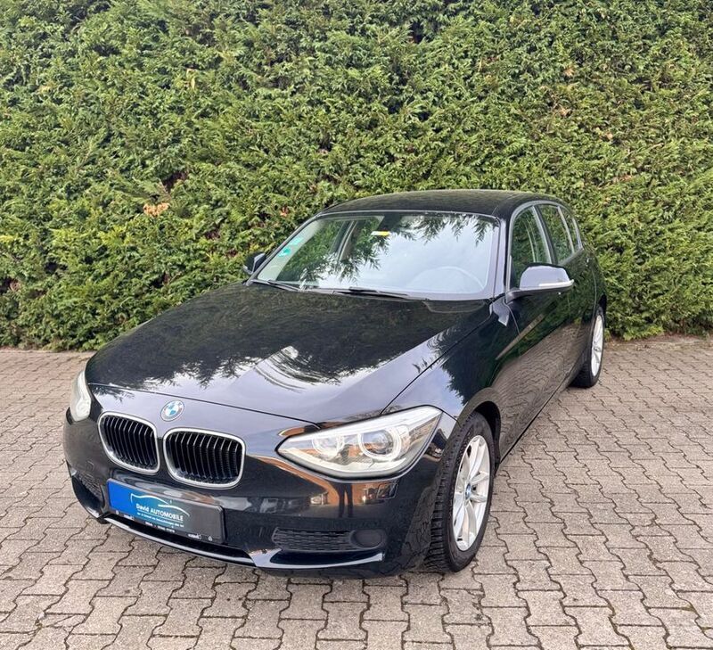 Schwarz Gebraucht 2012 BMW 116 Advantage Kleinwagen | 7.400 € (Fairer Preis) - Bild 1/4