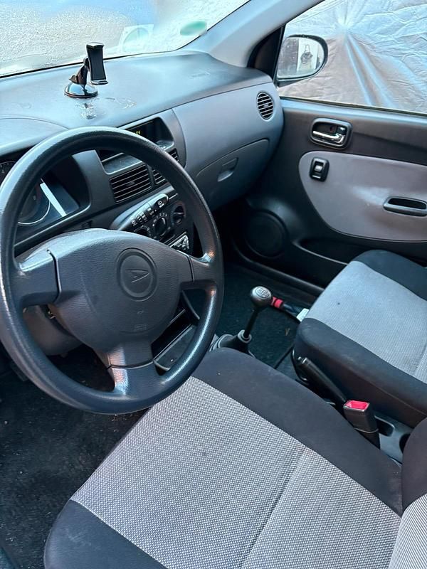 Gebraucht Daihatsu Cuore 70 PS (51 kW) 2004 Blau Kleinwagen