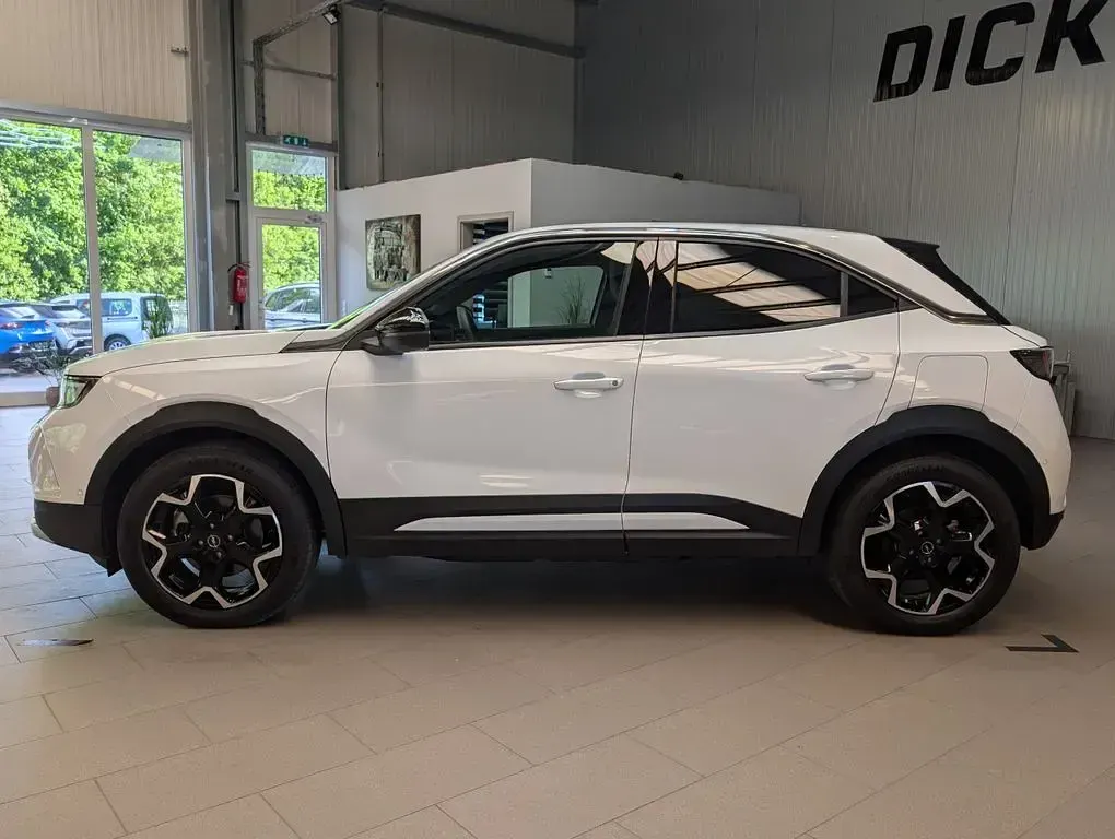 Gebraucht Opel Mokka-e Ultimate 100 kW (136 PS) 2023 Lack weiss banquise/typ au SUV