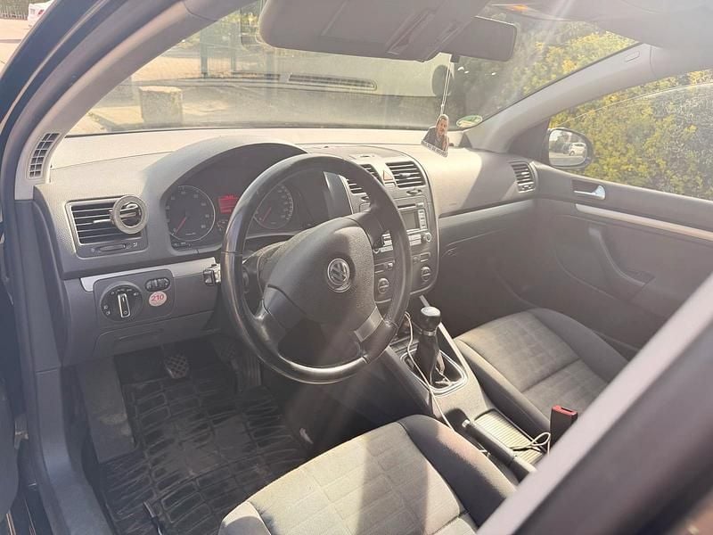 Second-hand VW Golf V 80 CP (58 kW) 2007 Negru Berlinǎ