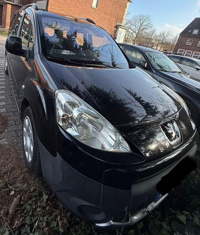 Gebraucht Peugeot Partner Tepee Family 109 PS (80 kW) 2009 Schwarz Van / Kleinbus