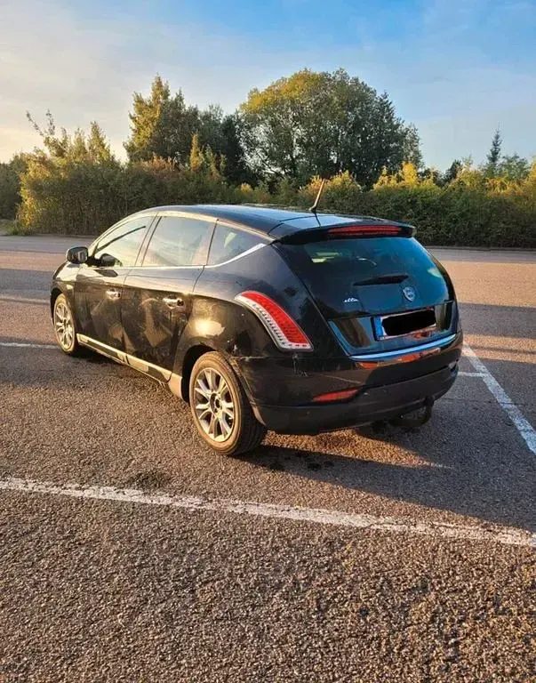 Gebraucht Lancia Delta 120 PS (88 kW) 2011 Schwarz Kleinwagen