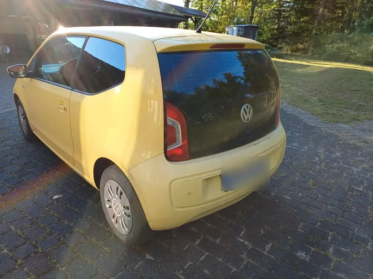 Usado VW up! 60 CV (44 kW) 2014 Amarillo Utilitario