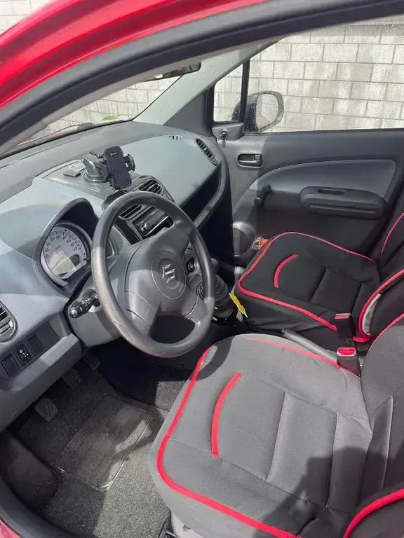 Usado Suzuki Splash Basic 65 HP (47 kW) 2009 Vermelho Citadino