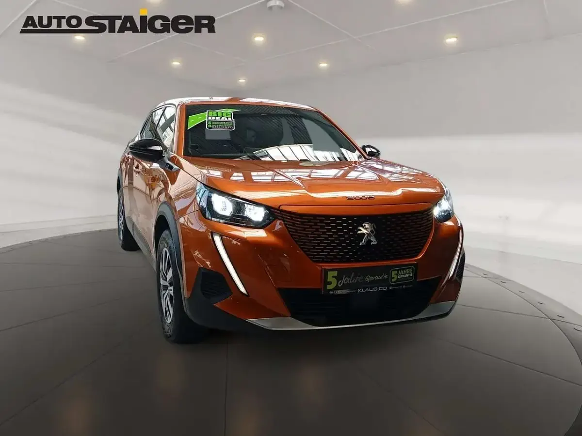 Gebraucht Peugeot e-2008 Active 100 kW (136 PS) 2023 Orange SUV