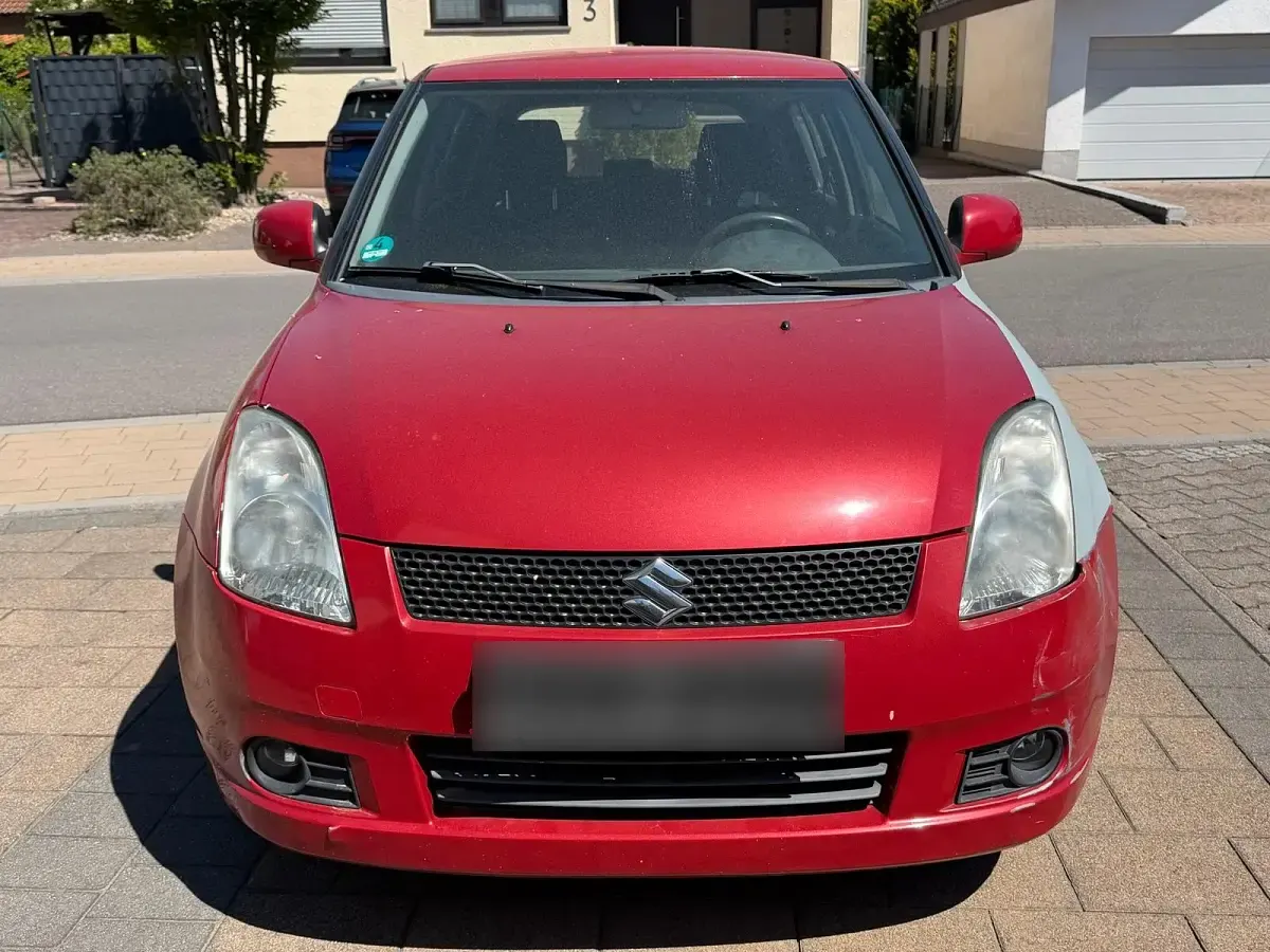 Second-hand Suzuki Swift 92 CP (67 kW) 2007 Roșu Hatchback