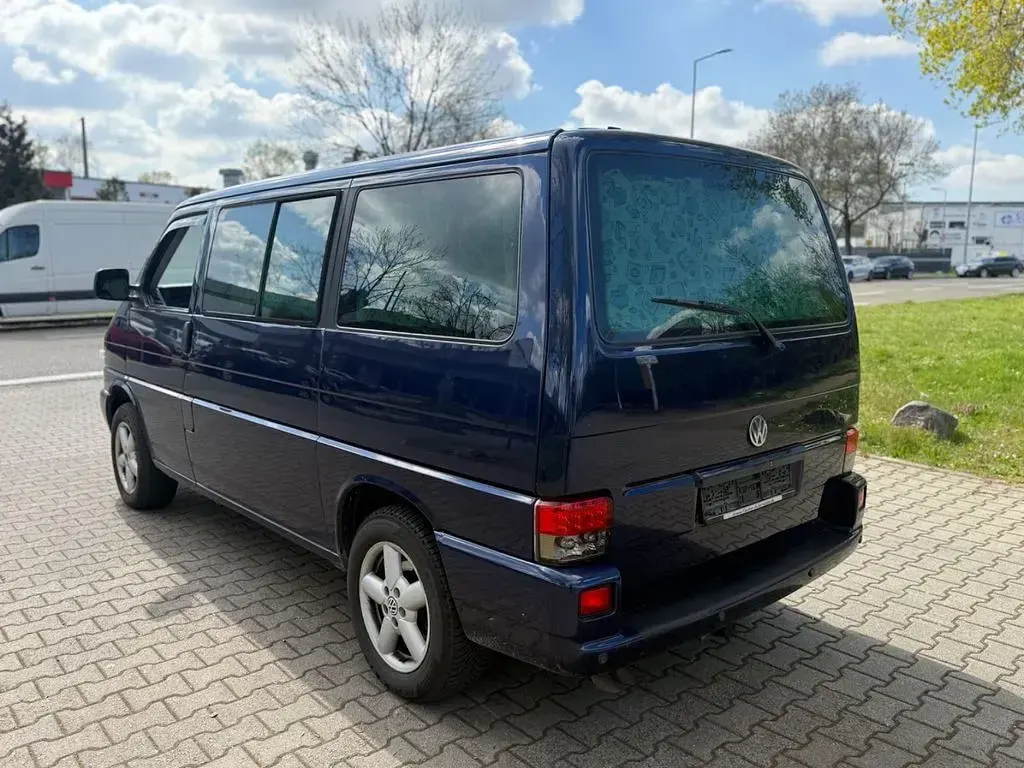 Second-hand VW Caravelle 151 CP (111 kW) 2003 Albastru Van