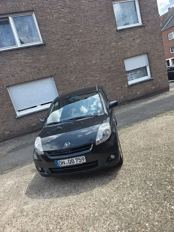 Gebraucht Daihatsu Sirion 91 PS (66 kW) 2008 Schwarz Kleinwagen