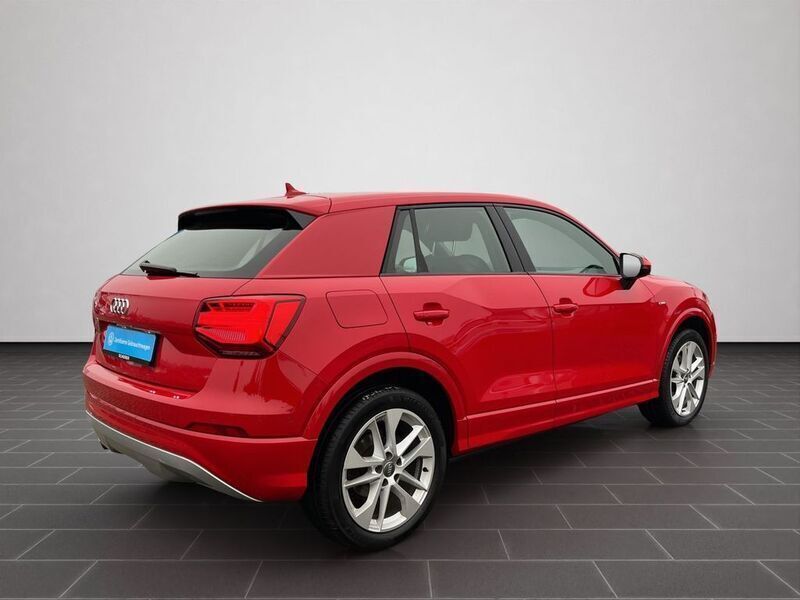 Gebraucht Audi Q2 Comfort 150 PS (110 kW) 2017 Tangorot metallic (metallic) SUV