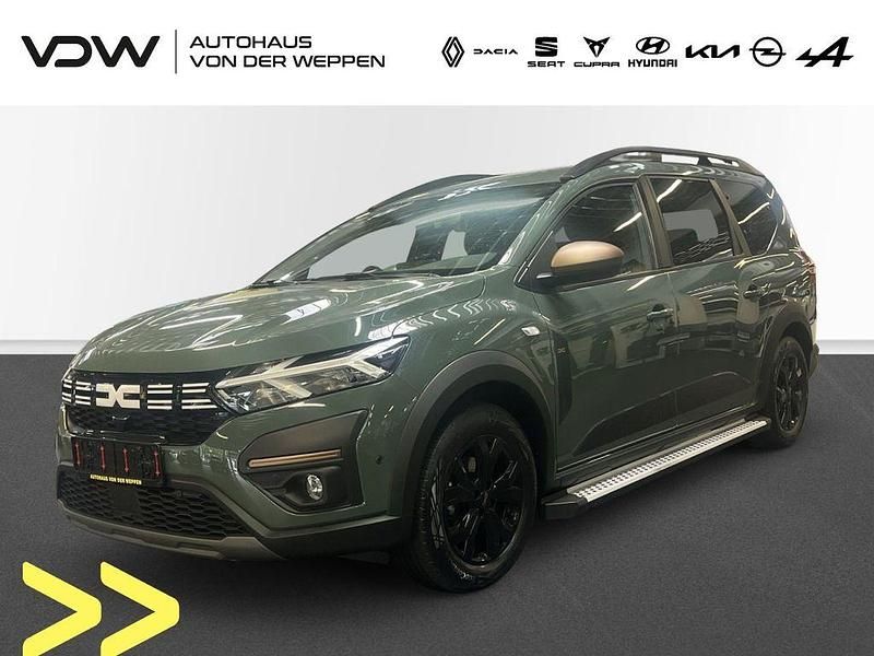 Staubgrau Gebraucht 2023 Dacia Jogger Extreme Van / Kleinbus | 24.880 € (Fairer Preis) - Bild 1/4