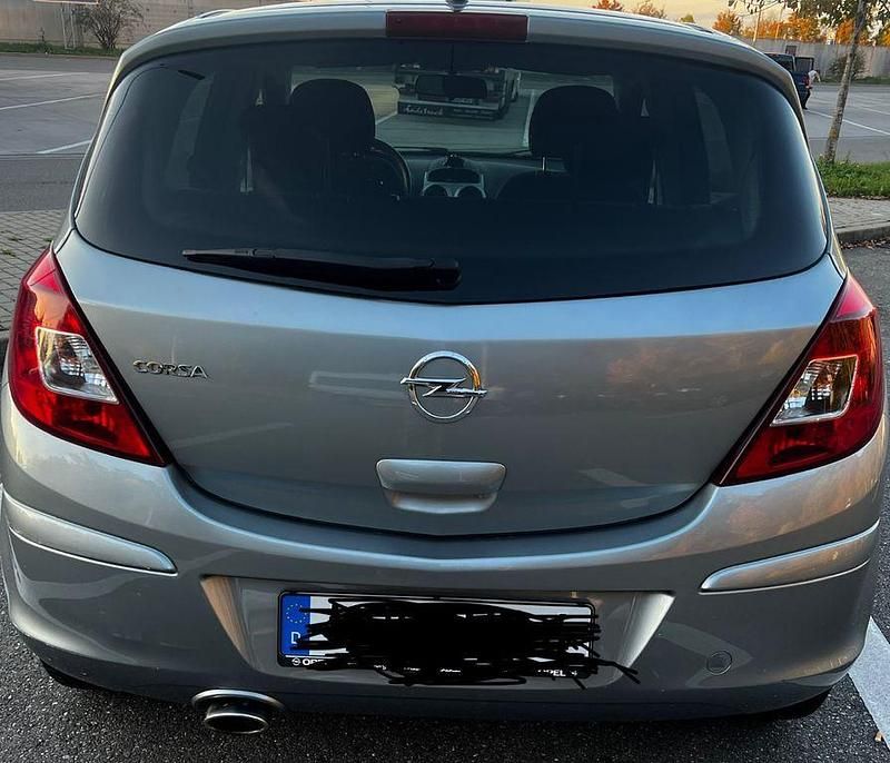 Second-hand Opel Corsa Satellite 101 CP (74 kW) 2011 Gri Berlinǎ