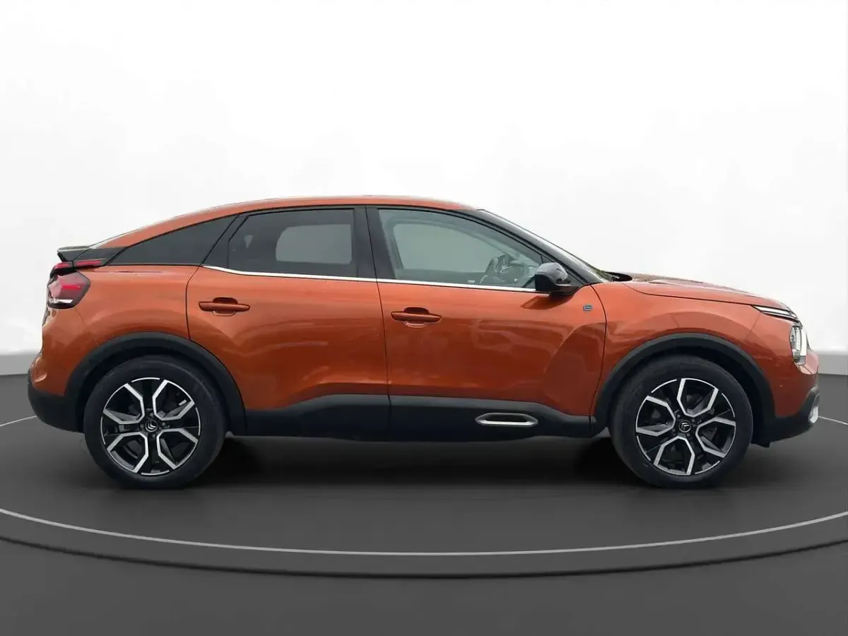 Second-hand Citroën e-C4 Shine 100 kW (136 CP) 2022 Portocaliu Berlinǎ