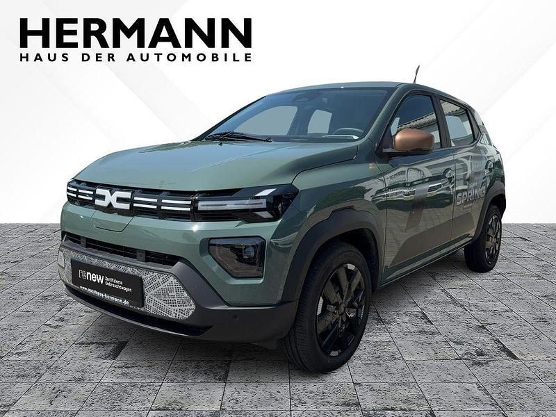Gebraucht Dacia Spring Extreme 47 kW (65 PS) 2024 Olivgrün (grün) Kleinwagen