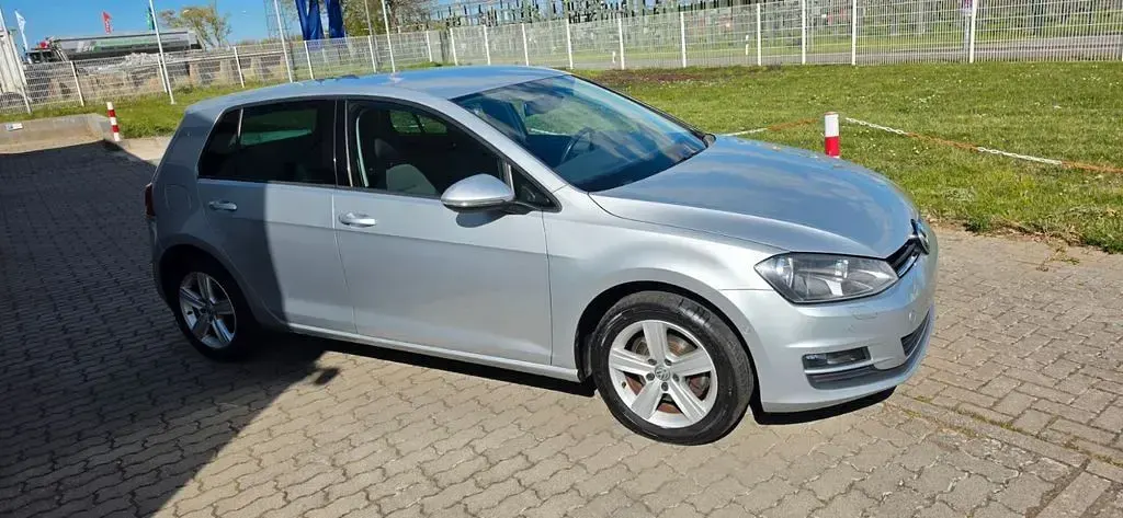 Second-hand VW Golf VII Trendline 86 CP (63 kW) 2013 Argintiu Berlinǎ