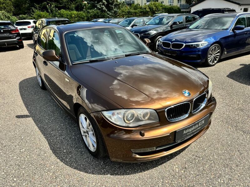 Braun Gebraucht 2011 BMW 116 Kleinwagen | 5.950 € (Teuer) - Bild 1/4