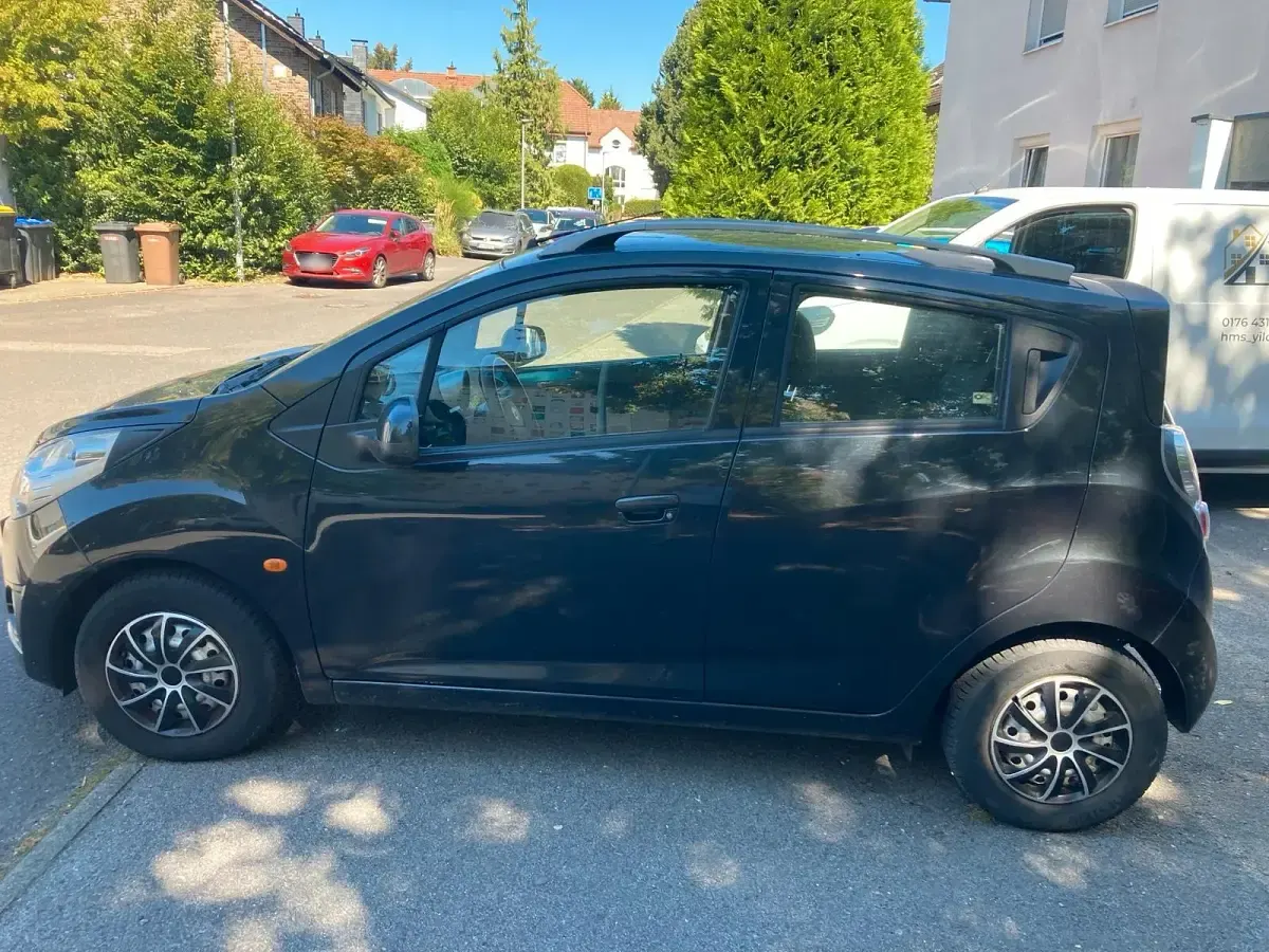 Gebraucht Chevrolet Spark 82 PS (60 kW) 2011 Schwarz Kleinwagen