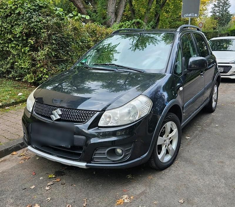 Schwarz Gebraucht 2009 Suzuki SX4 SUV | 2.350 € - Bild 1/4