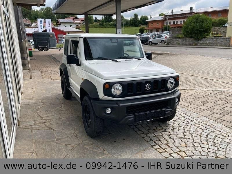Weiß Gebraucht 2024 Suzuki Jimny Comfort SUV | 29.890 € (Fairer Preis) - Bild 1/4
