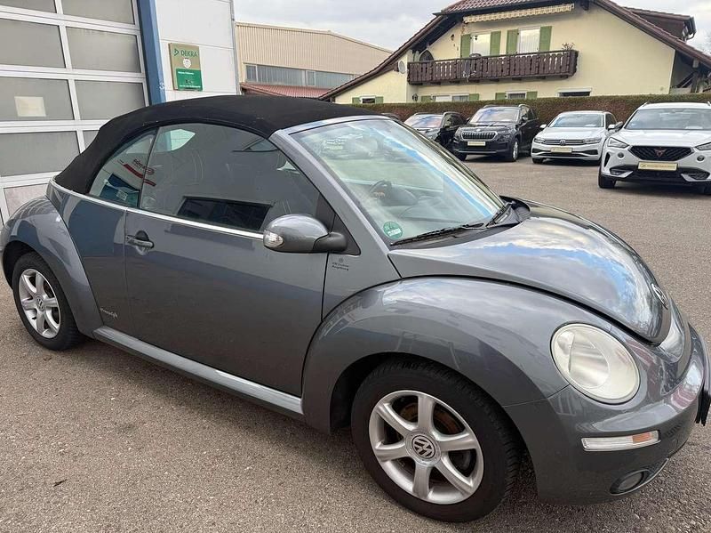 Gebraucht VW New Beetle 102 PS (75 kW) 2010 Platinum grey metallic Kleinwagen