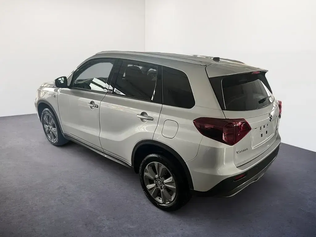 Gebraucht Suzuki Vitara Comfort 129 PS (94 kW) 2024 Savannah ivory metallic / cosm SUV