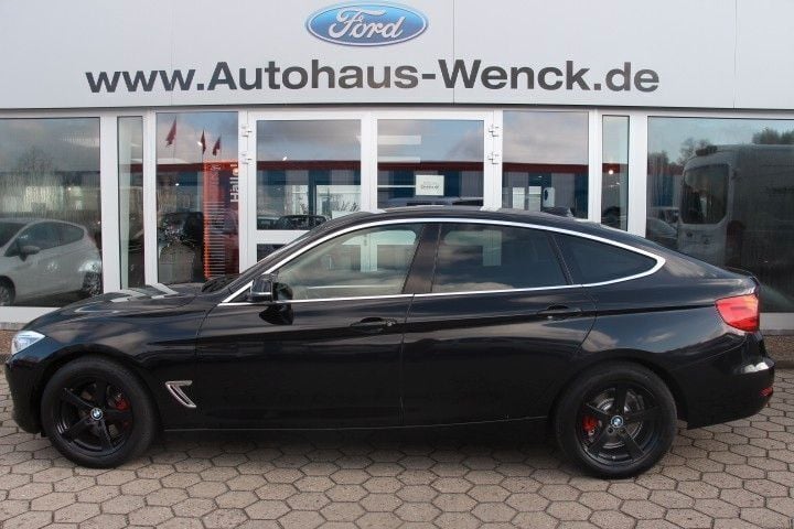 Schwarz Gebraucht 2013 BMW 325 Gran Turismo Luxury Line Limousine | 8.970 € - Bild 1/4
