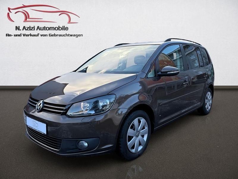 Braun Gebraucht 2012 VW Touran Comfortline Van / Kleinbus | 6.999 € (Guter Preis) - Bild 1/4
