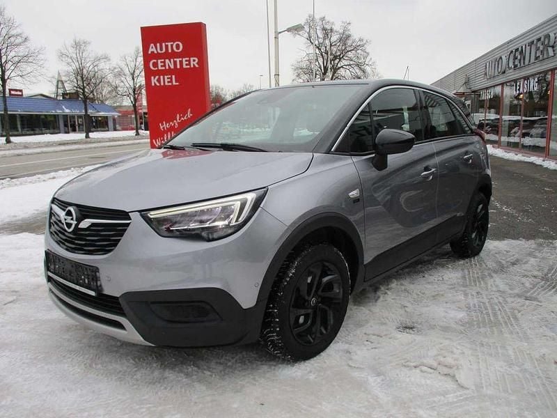 Grau (metallic) Gebraucht 2021 Opel Crossland X SUV | 12.980 € (Superpreis) - Bild 1/4