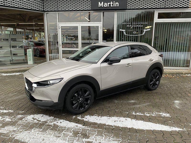 Braun Neu 2025 Mazda CX-30 Homura-Line SUV | 30.590 € - Bild 1/4
