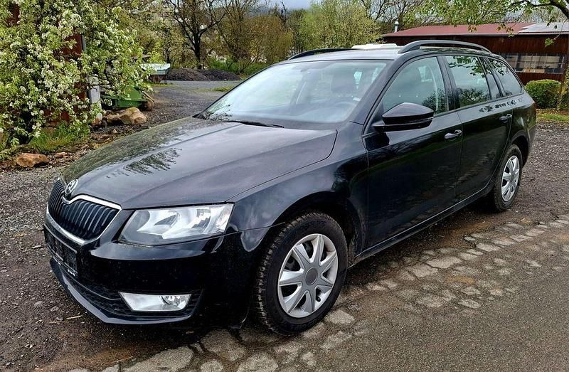 Second-hand Skoda Octavia Ambition 150 CP (110 kW) 2013 Negru Break