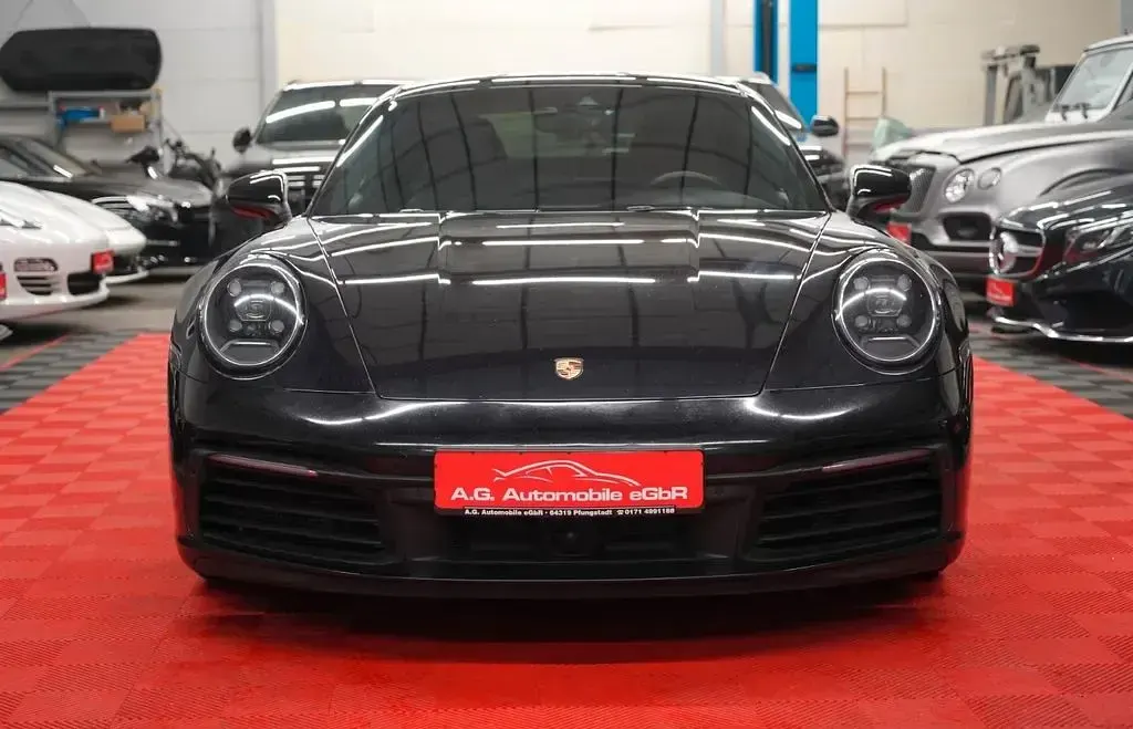 Gebraucht Porsche 911 Carrera 4 385 PS (283 kW) 2020 Tiefschwarz Coupé