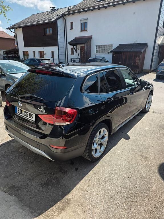 Second-hand BMW X1 116 CP (85 kW) 2012 Negru SUV