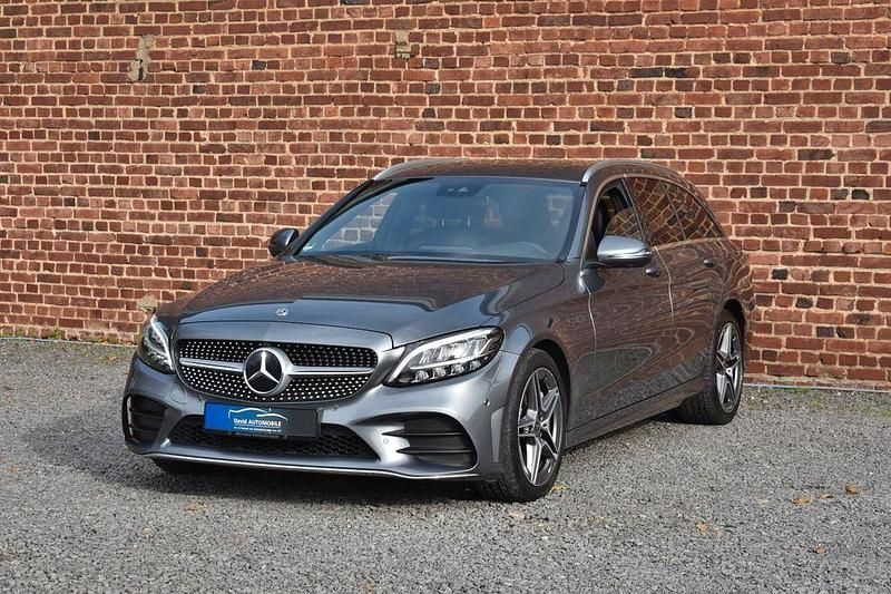 Grau Gebraucht 2018 Mercedes C300 AMG line Limousine | 21.990 € (Superpreis) - Bild 1/4