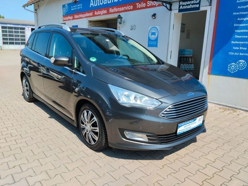 Grau Gebraucht 2016 Ford Grand C-Max Titanium Van / Kleinbus | 6.999 € (Fairer Preis) - Bild 1/4