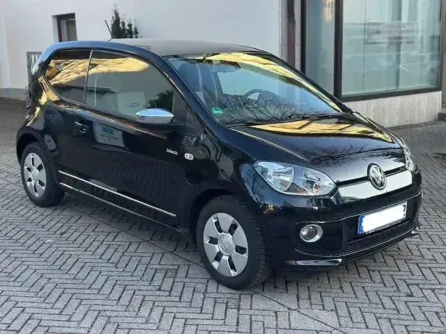 Usado VW up! 75 CV (55 kW) 2011 Negro Utilitario
