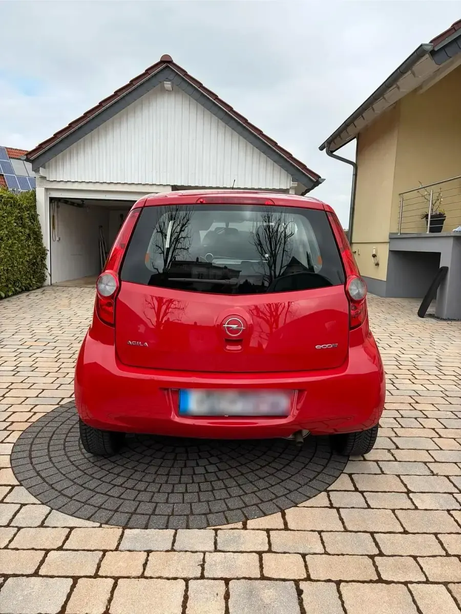 Gebraucht Opel Agila 68 PS (50 kW) 2013 Rot Kleinwagen