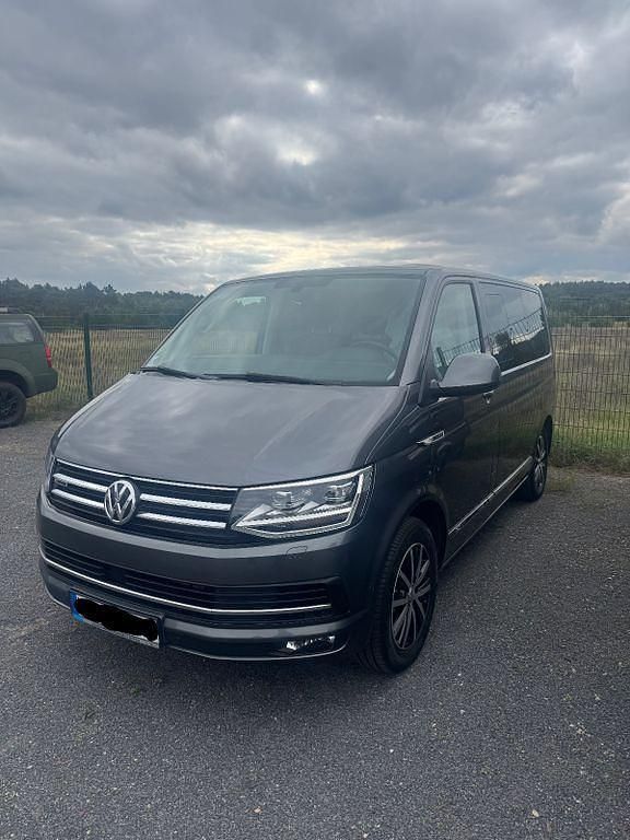 Grau Gebraucht 2018 VW Multivan Van | 35.799 € (Superpreis) - Bild 1/4