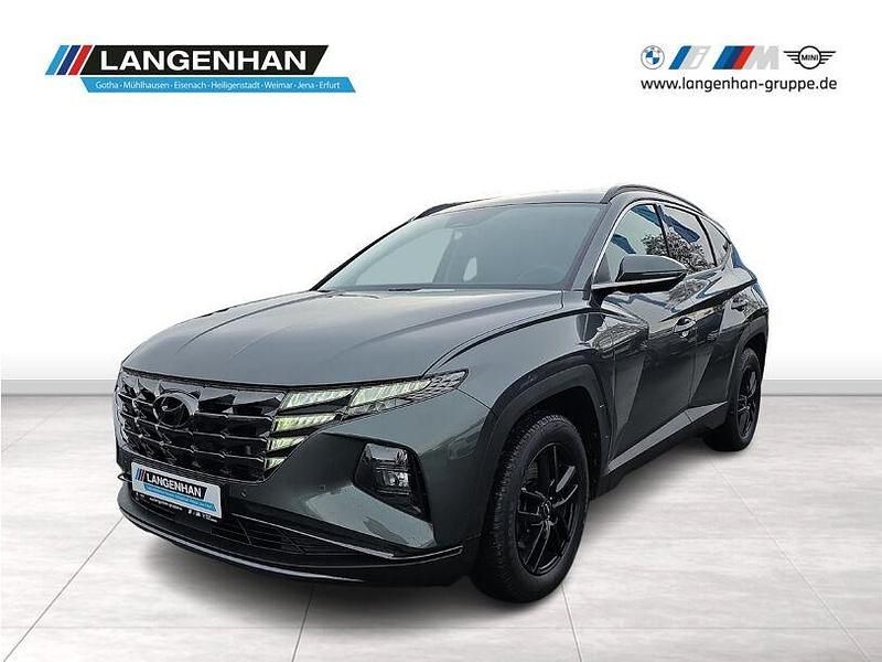 Grau Gebraucht 2021 Hyundai Tucson SUV | 23.452 € (Fairer Preis) - Bild 1/4