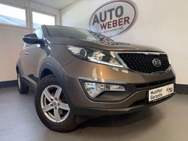 Braun Gebraucht 2015 Kia Sportage DREAM-TEAM Edition SUV | 11.890 € (Fairer Preis) - Bild 1/4