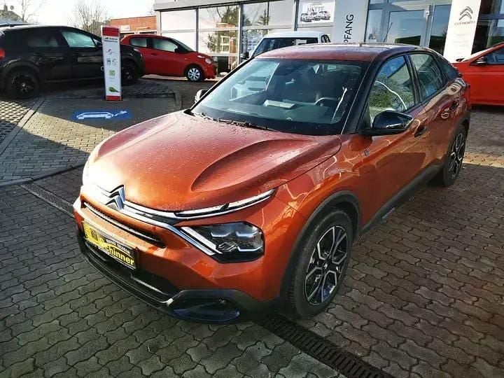 Braun Gebraucht 2022 Citroën e-C4 Feel Limousine | 17.890 € (Superpreis) - Bild 1/3