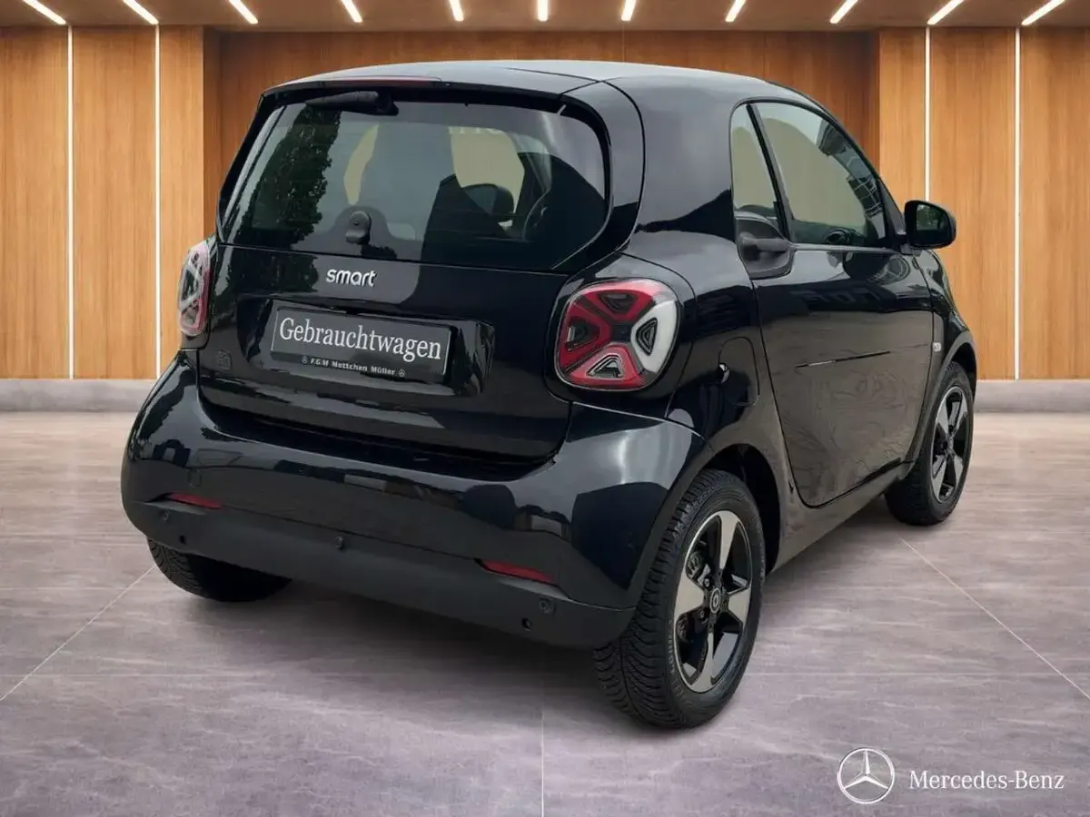 Gebraucht Smart ForTwo Coupé 60 kW (82 PS) 2024 Bodypanels in black Kleinwagen