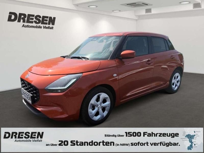 Orange Gebraucht 2024 Suzuki Swift Comfort Kleinwagen | 16.990 € (Fairer Preis) - Bild 1/4