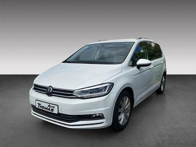 Gebraucht VW Touran Highline 150 PS (110 kW) 2024 Oryxweiß perlmutteffekt Van / Kleinbus
