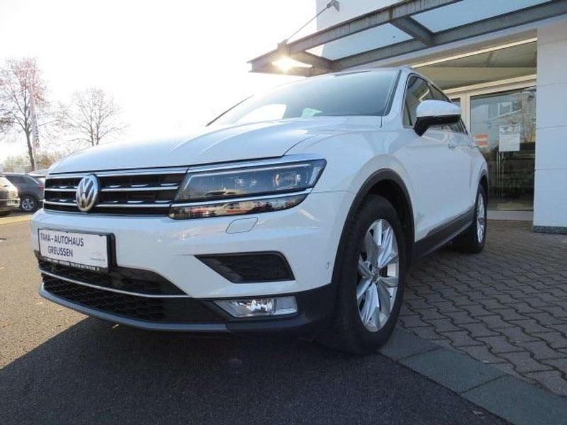 Pure white Gebraucht 2017 VW Tiguan Highline SUV | 21.990 € (Fairer Preis) - Bild 1/4