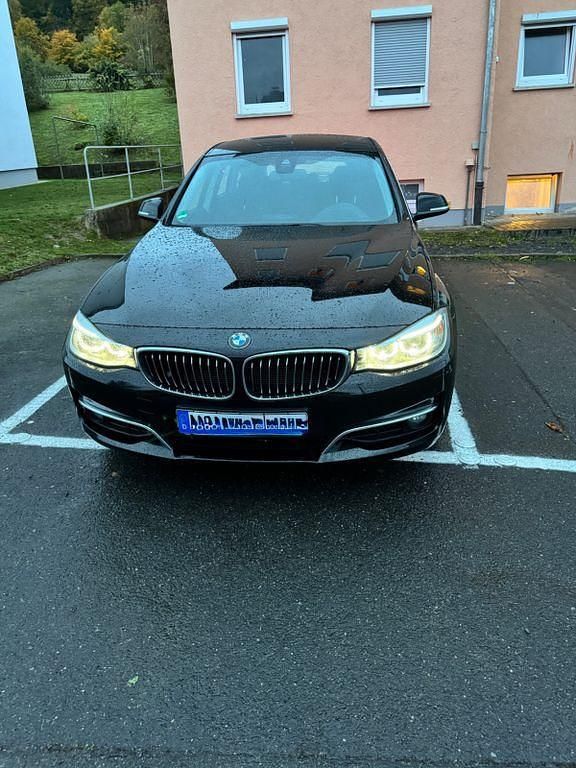 Schwarz Gebraucht 2014 BMW 320 Gran Turismo Luxury Line Limousine | 10.800 € (Fairer Preis) - Bild 1/4