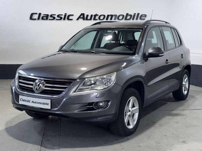 Grau Gebraucht 2011 VW Tiguan Track & Field SUV | 9.900 € (Fairer Preis) - Bild 1/4