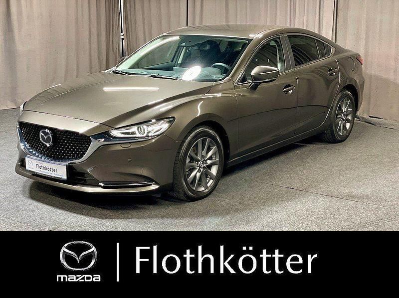 Grau metallic Gebraucht 2021 Mazda 6 Active Limousine | 22.940 € (Fairer Preis) - Bild 1/4